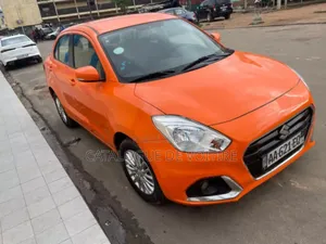Photo - Suzuki Dzire 2024 Orange