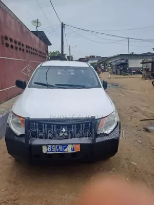 Photo - Mitsubishi L200 2014 Blanc cassé