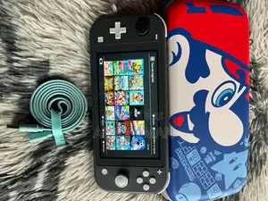 Photo - Nintendo Switch Lite Craqué +20 Jeux