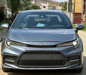 Photo - Toyota Corolla SE (1.8L 4cyl 2A) 2019 Gris
