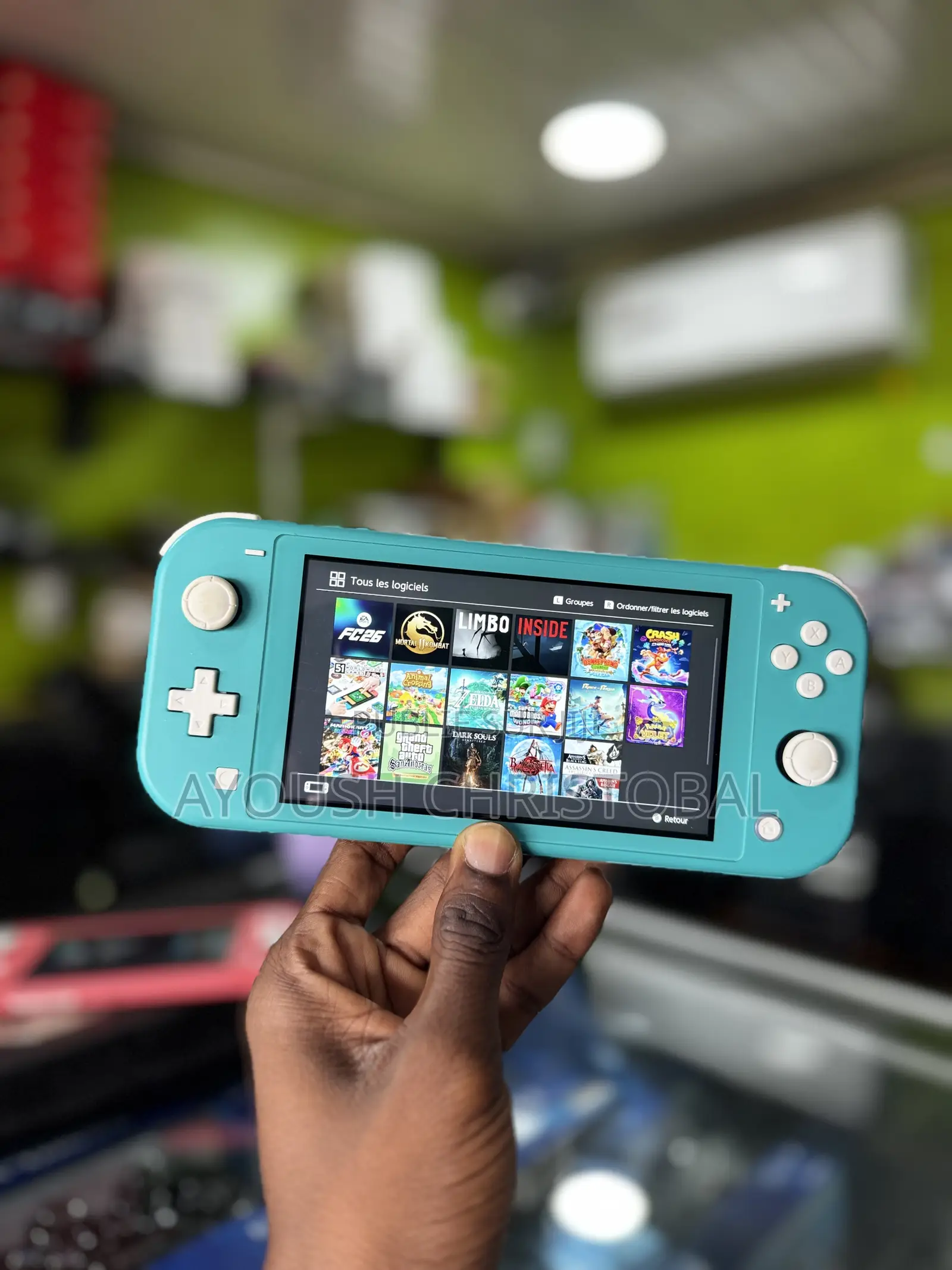 Switch Lite Cracké 16 Jeux + Fc26