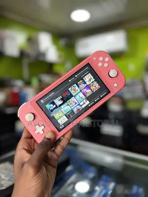 Switch Lite Cracké 16 Jeux + Fc26