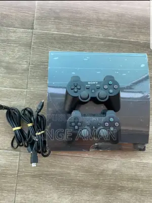 Photo - Ps3 Sony Playstation 3 Craquée Avec Deux Manettes + Tout Accessoire
