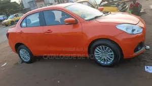 Photo - Suzuki Dzire 2021 Orange