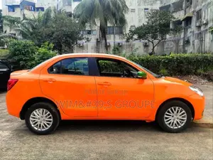 Suzuki Dzire 2024 Orange