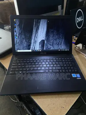 Photo - Ordinateur Portable Asus 4GB Intel Pentium HDD 32GB