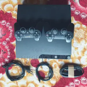 Photo - Console Ps3 Slim Craquée Avec 30 Jeux Tout Passe Bien Propre