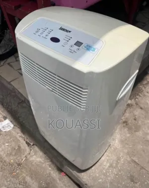 Photo - New Version Clim Neuf Dans Carton en Promo