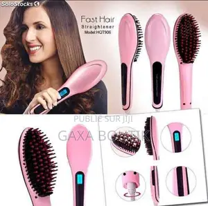 Brosse Lissante Et Chauffante Pour Cheveux Rose