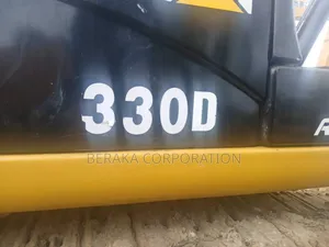 Photo - Machine 330d en Vente