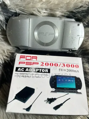 PSP Gris Cracker + Jeux