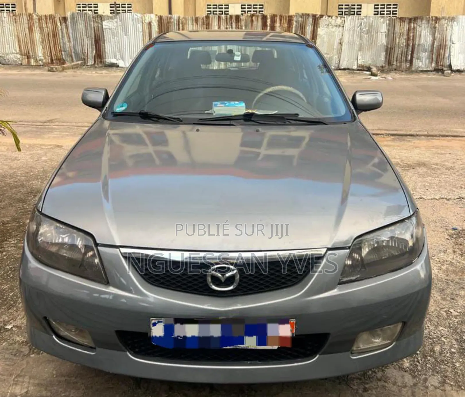 Mazda 323 1.6 2003 Gris