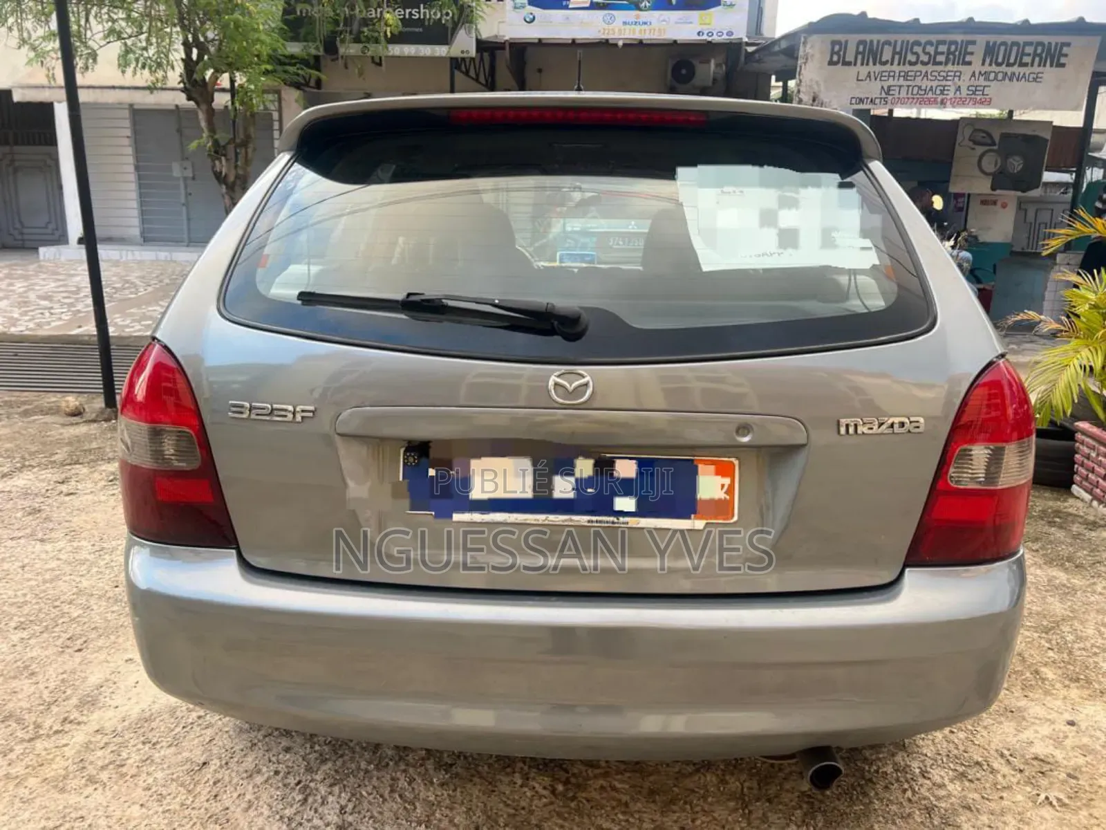 Mazda 323 1.6 2003 Gris