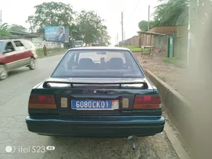 Photo - Nissan Sunny B12 Coupe 1.5 1988 Vert