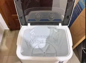 Photo - Machine a Laver Portatif