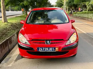Photo - Peugeot 307 2004 Rouge