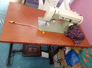 Machine a Coudre Électrique