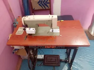 Machine a Coudre Électrique