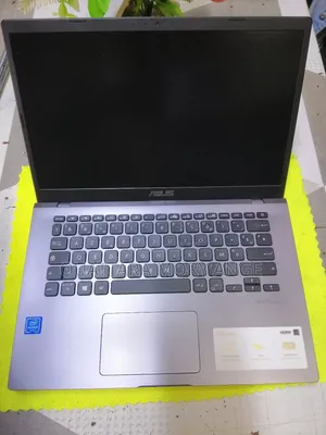 Photo - New Ordinateur Portable Asus X409JA 4GB Intel Celeron HDD 1T