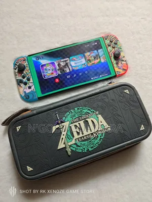 Photo - Nintendo Switch Oled Cracker + Jeux