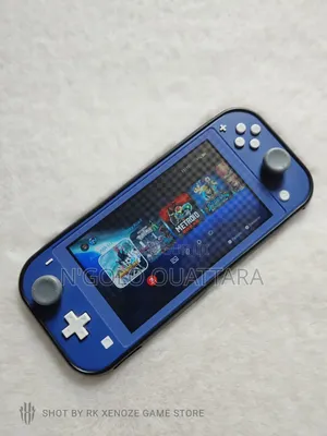 Photo - Nintendo Switch Lite Cracker + Jeux