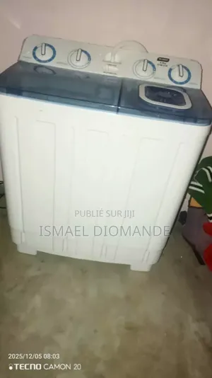 Photo - Machine a Laver Habits