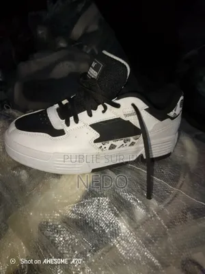 Photo - Les Chaussures Friperie a 6000