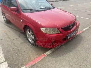 Mazda 323 1.6 2002 Rouge