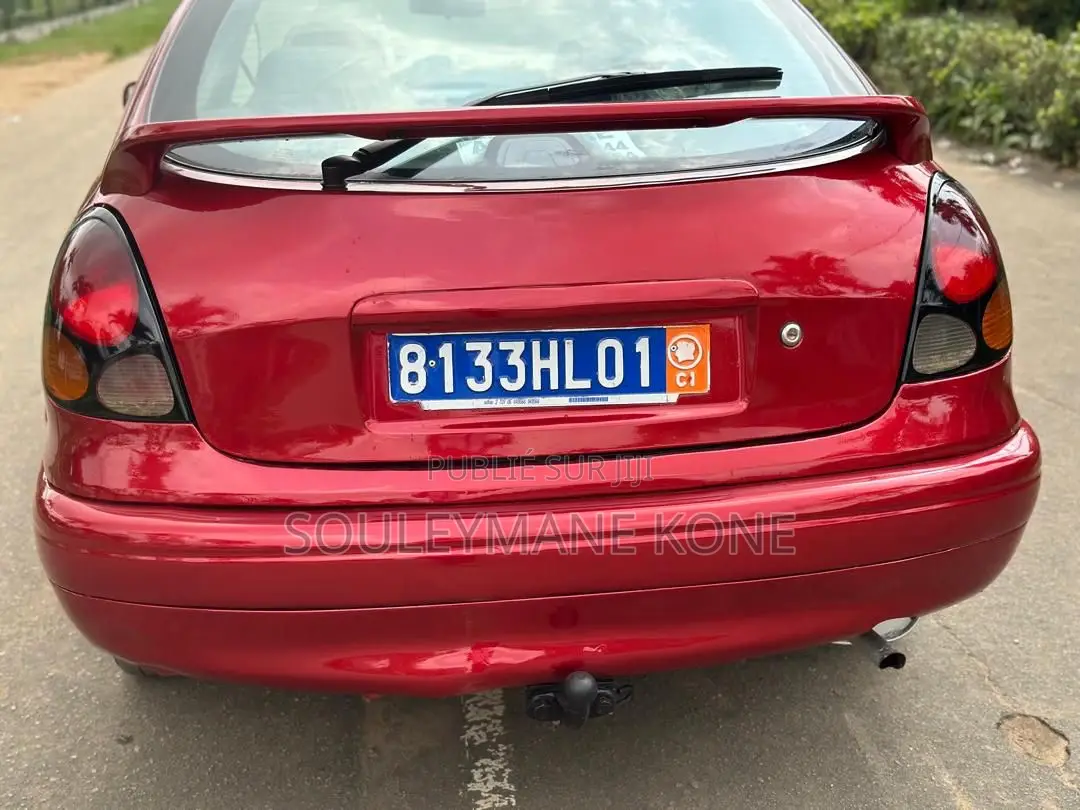 Toyota Corolla 2002 Rouge