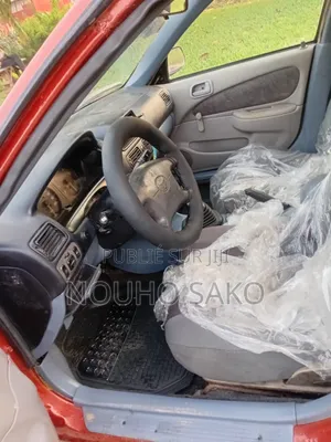 Toyota Corolla 2004 Rouge