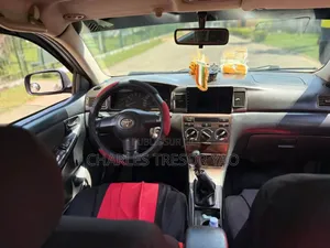 Toyota Corolla 2002 Rouge