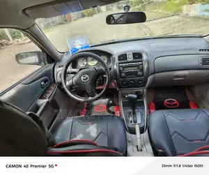 Mazda 323 1.6 2002 Gris