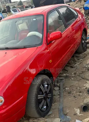 Toyota Corolla 2002 Rouge