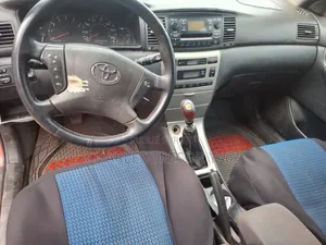 Toyota Corolla 2003 Rouge