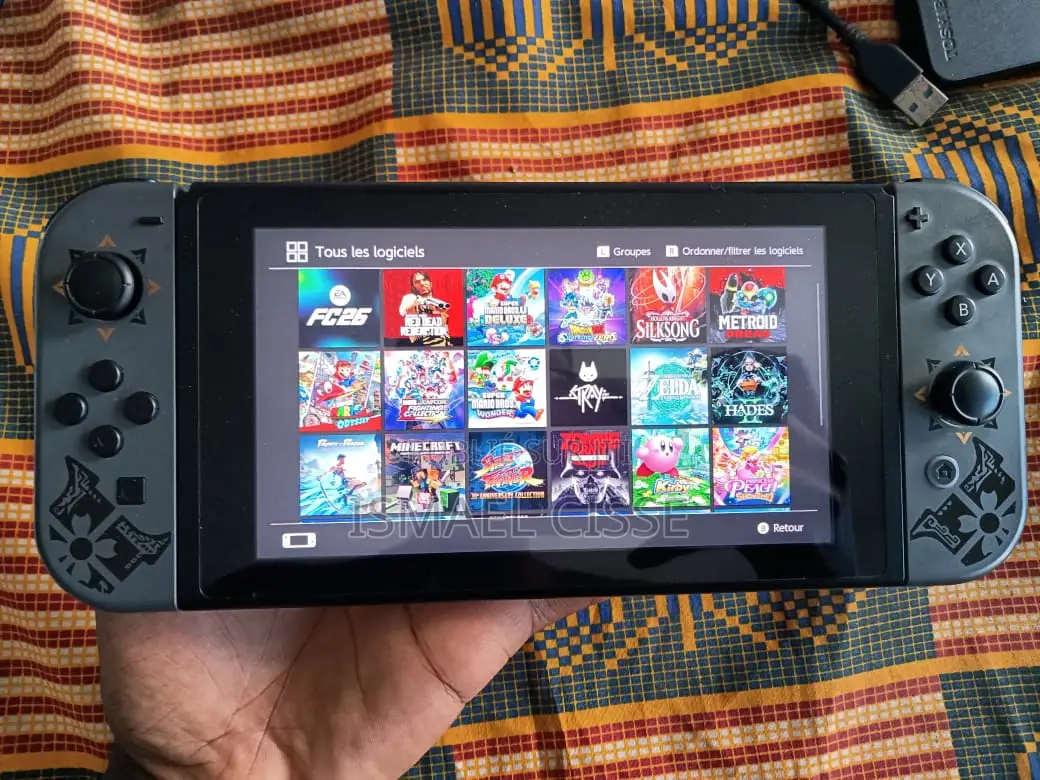 Nintendo Switch Craquee + 24 Jeux(Fc26, Zelda, Mario, Dragon Ball)