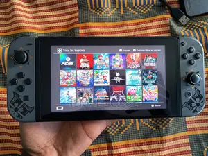 Nintendo Switch Craquee + 24 Jeux(Fc26, Zelda, Mario, Dragon Ball)