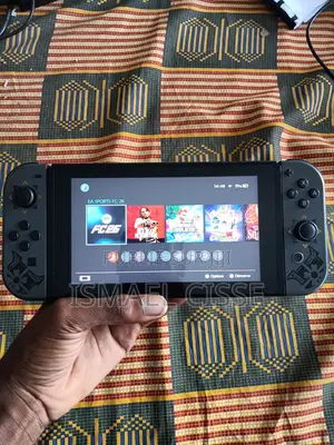 Nintendo Switch Craquee + 24 Jeux(Fc26, Zelda, Mario, Dragon Ball)