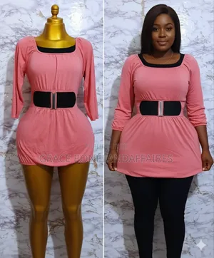 Haut Orange Avec Ceinture Noire Integrée. Solde : 1500fcfa