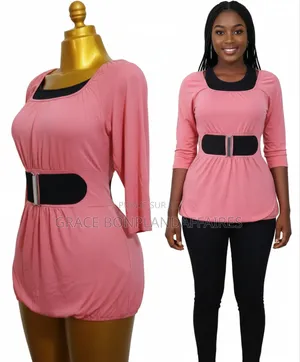 Haut Orange Avec Ceinture Noire Integrée. Solde : 1500fcfa