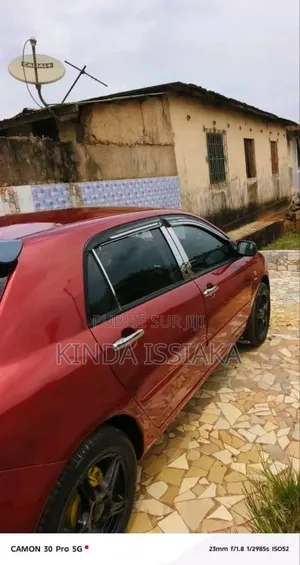 Toyota Corolla 2004 Rouge