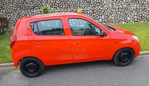 Suzuki Alto 2023 Orange