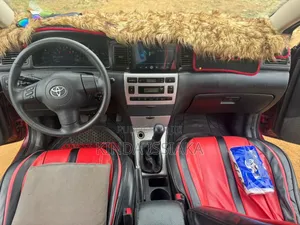 Toyota Corolla 2004 Rouge