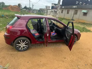Toyota Corolla 2004 Rouge