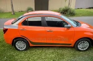 Suzuki Dzire 2024 Orange