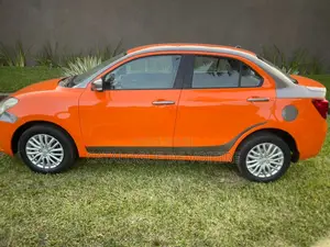Suzuki Dzire 2024 Orange