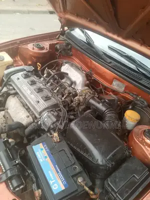 Toyota Corolla Hatchback 1999 Orange