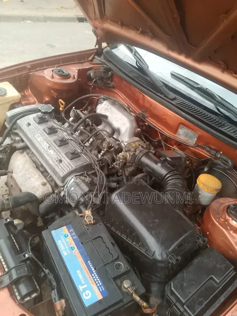 Toyota Corolla Hatchback 1999 Orange