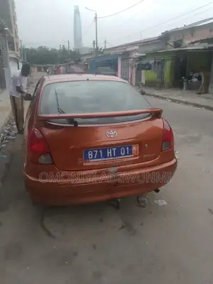 Toyota Corolla Hatchback 1999 Orange