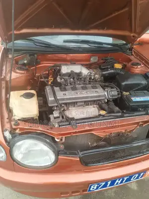 Toyota Corolla Hatchback 1999 Orange