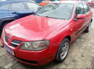 Nissan Almera Tino 2002 Rouge